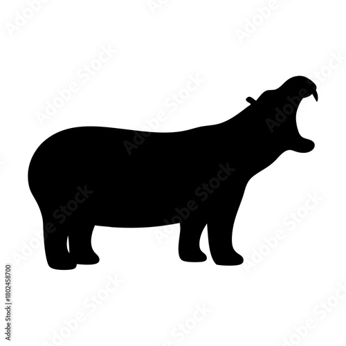 Black silhouette of a hippopotamus standing with its mouth wide open