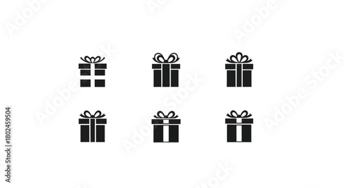 Collection of stylized black gift boxes with ribbons on a white background