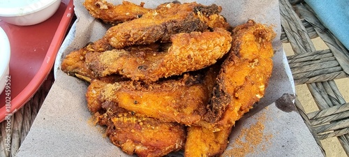 Delicious fried fish served on a colourful table, representing authentic coastal cuisine and traditional flavours of Pakistan. Delicious fish steak slices on a plate. Beautiful 4K Footage.