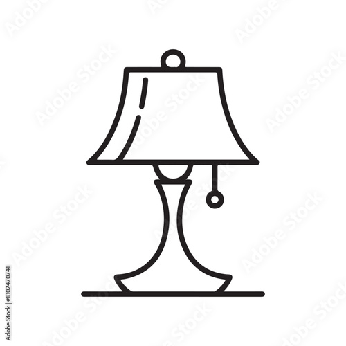 Simple black and white line drawing of a classic table lamp