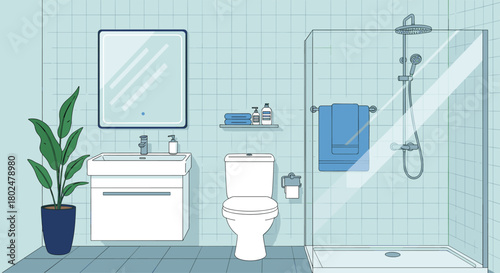 Modern bathroom with a sink, toilet, and glass shower stall.