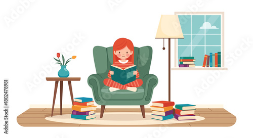 A young girl with red hair sits cross-legged in a green armchair reading a book, surrounded by stacks of books.
