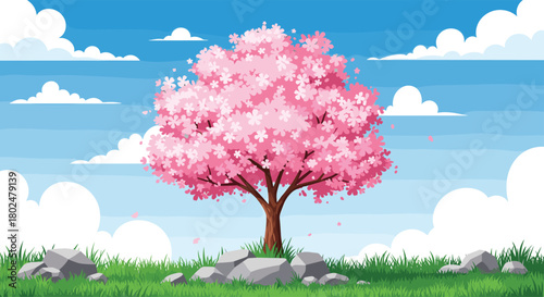 A beautiful blooming cherry blossom tree in full bloom with pink flowers and falling petals under a blue sky.