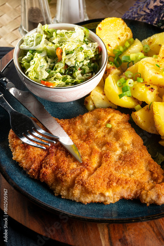 Pork chop with potatoes.