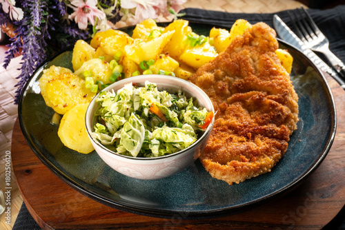 Pork chop with potatoes.