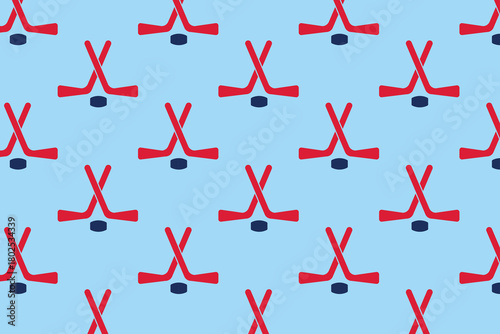 Crossed hockey sticks and puck pattern on blue background . Hockey sticks background . Vector illustration