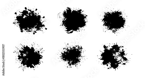 Set of grunge ink splatter shapes on white background