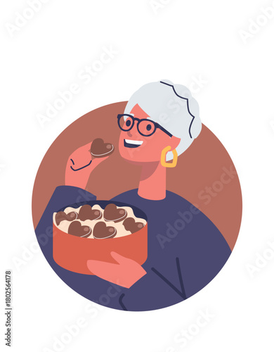 Elderly woman eating chocolate candies