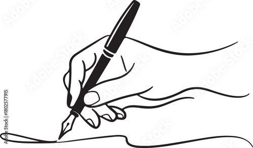 Hand writing with a fountain pen and flowing ink on paper