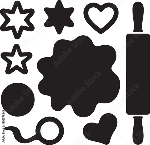 Collection of baking cookie cutters and rolling pin silhouettes