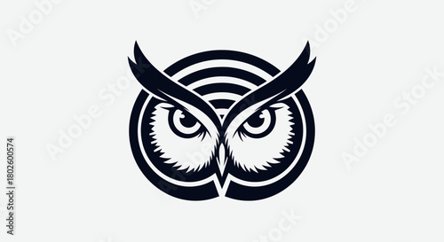 Owl face logo with concentric circles behind it, black on white background.