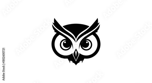 A minimalist black and white illustration of an owl's face with large, round eyes and prominent ear tufts.