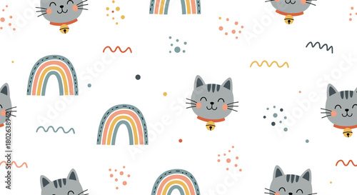 A whimsical pattern featuring adorable cartoon cats and colorful rainbows scattered across a white background.