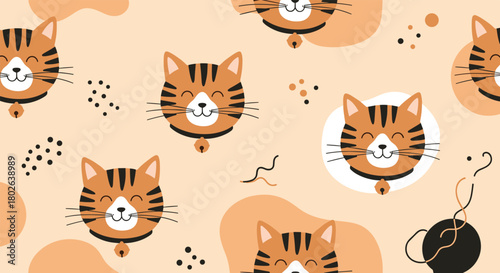A delightful pattern featuring adorable orange tabby cats with playful expressions on a soft peachy background.