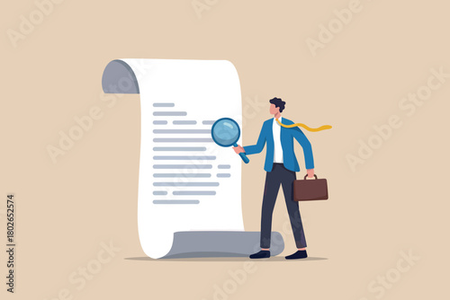 Businessman uses magnifying glass to review document or contract