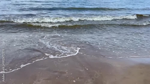 Beautiful sea sunset. Sandy beach, sea at sunset. Nature in the evening. High quality FullHD footage