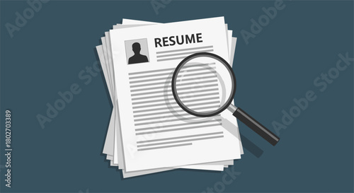 Job search concept with magnifying glass on resume documents