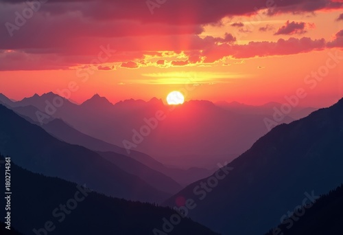 Captivating Sunset Over Majestic Mountain Range Silhouetted Against Fiery Sky