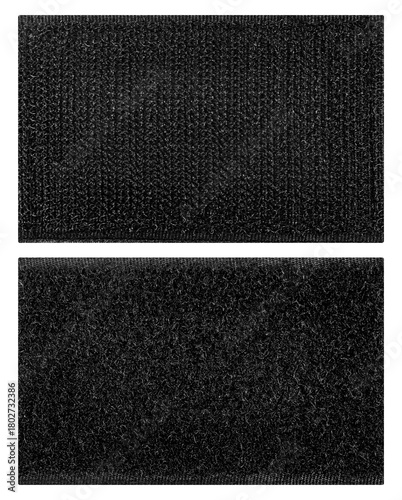 Isolated photo of black velcro square patches on white background.