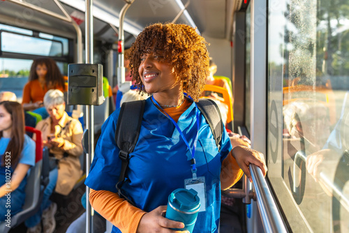 Young black nurse student commuting by bus to hospital