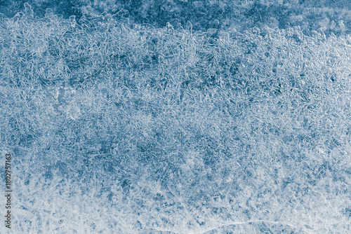 Ice texture crystal, blue tones background. Textured, cold, frosty surface of ice.