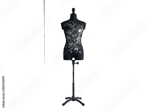 Elegant black mannequin with floral lace detail, displayed on a stand against a clean white background.