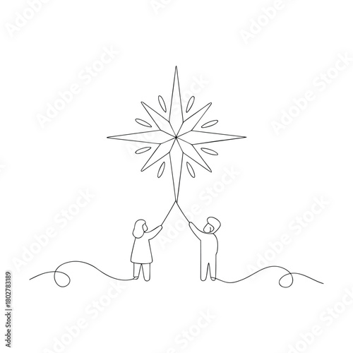 Two people holding up a star with strings christmas