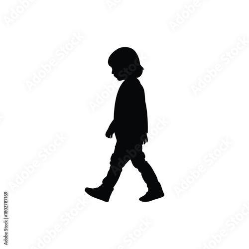 A silhouette of a young child walking with their head down against a stark white background looking sad