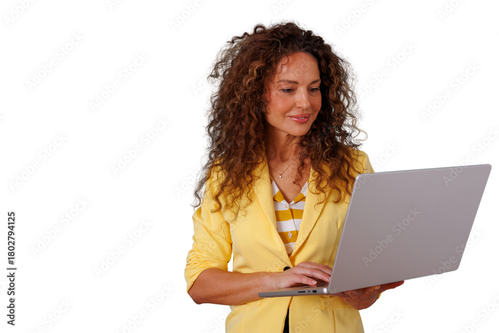 Naklejka premium Professional businesswoman in yellow blazer working on laptop, managing business remotely, smiling, transparent background