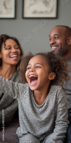 Happy african american family enjoying cheerful moment indoors
