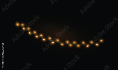 Softly glowing warm yellow string lights creating a gentle curve against a deep black background