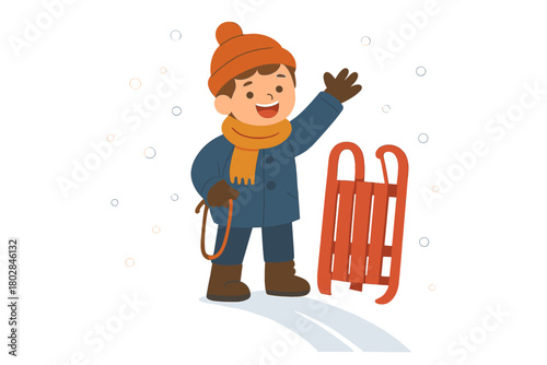 A young boy stands atop a snowy hill with a red sled in winter