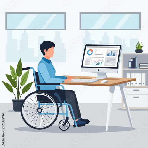 A person in a wheelchair works at a computer in a modern office setting.