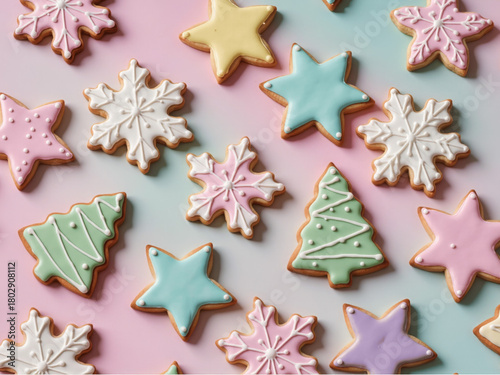Assorted Christmas sugar cookies in shapes of stars, snowflakes, and trees, top-down shot, pastel background, soft natural lighting