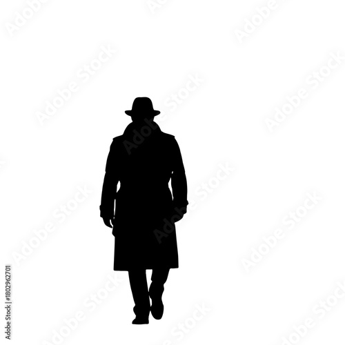 Silhouette of a man wearing a hat and trench coat walking forward on a white background in a studio shot