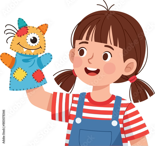 Smiling girl holding a cute handmade cat hand puppet