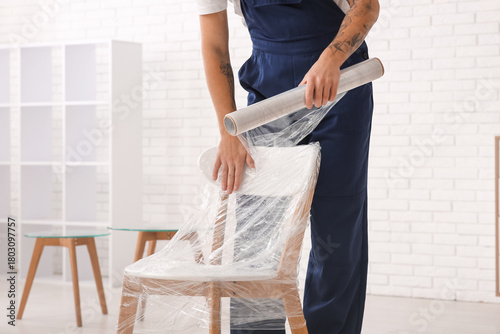 Professional mover wrapping...