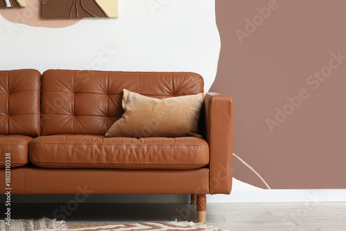Brown sofa with soft cushio...