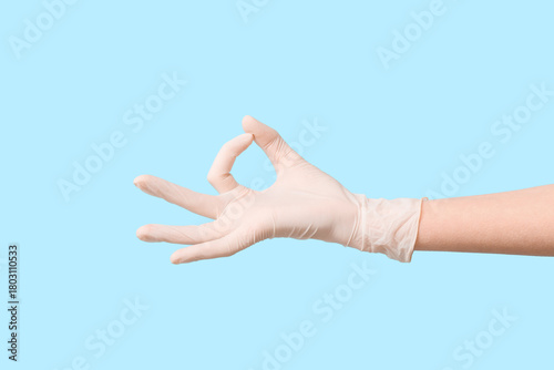 Female hand in medical glov...
