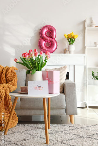 Vase with tulips, cup and g...