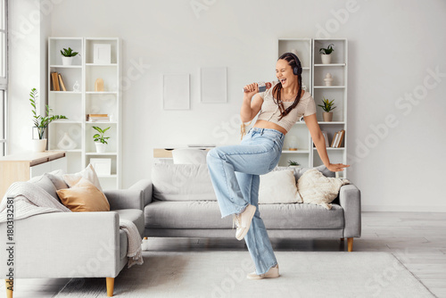 Young woman in headphones w...
