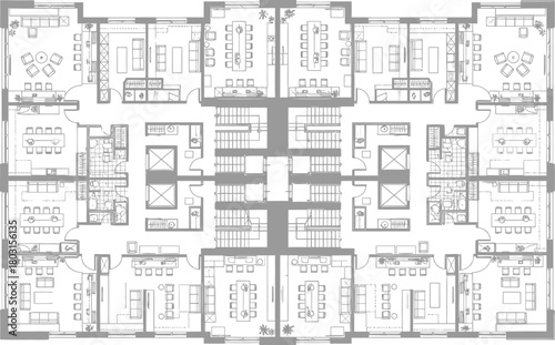 Detailed architectural floor plan drawing of a symmetrical multi story residential building with numerous apartments and central common areas