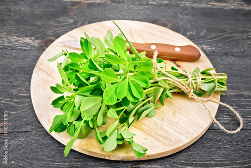 Fenugreek green on dark board