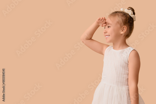 Cute little girl looking fa...