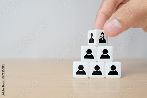 business hand man put arranging on dice that family or company Succession business concept from old generation to next generation.