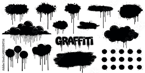 Collection of black graffiti spray paint splatters drips and grunge textures on white background