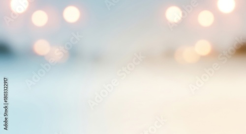 A snowy landscape with a blurred background of lights.