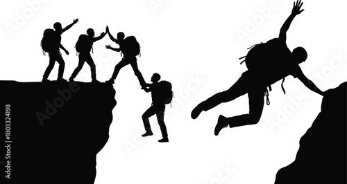 Silhouettes of hikers helping each other cross a gap between cliffs climbing teamwork