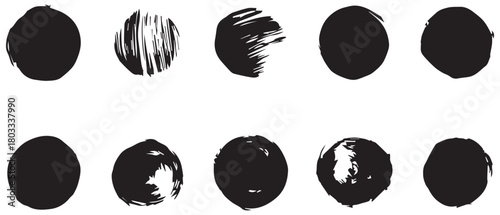 black brush stroke circles with various textures on a white background.