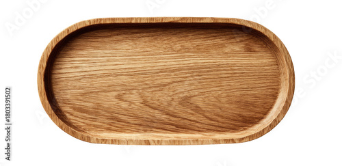 Empty oval wooden tray with natural grain on black background
